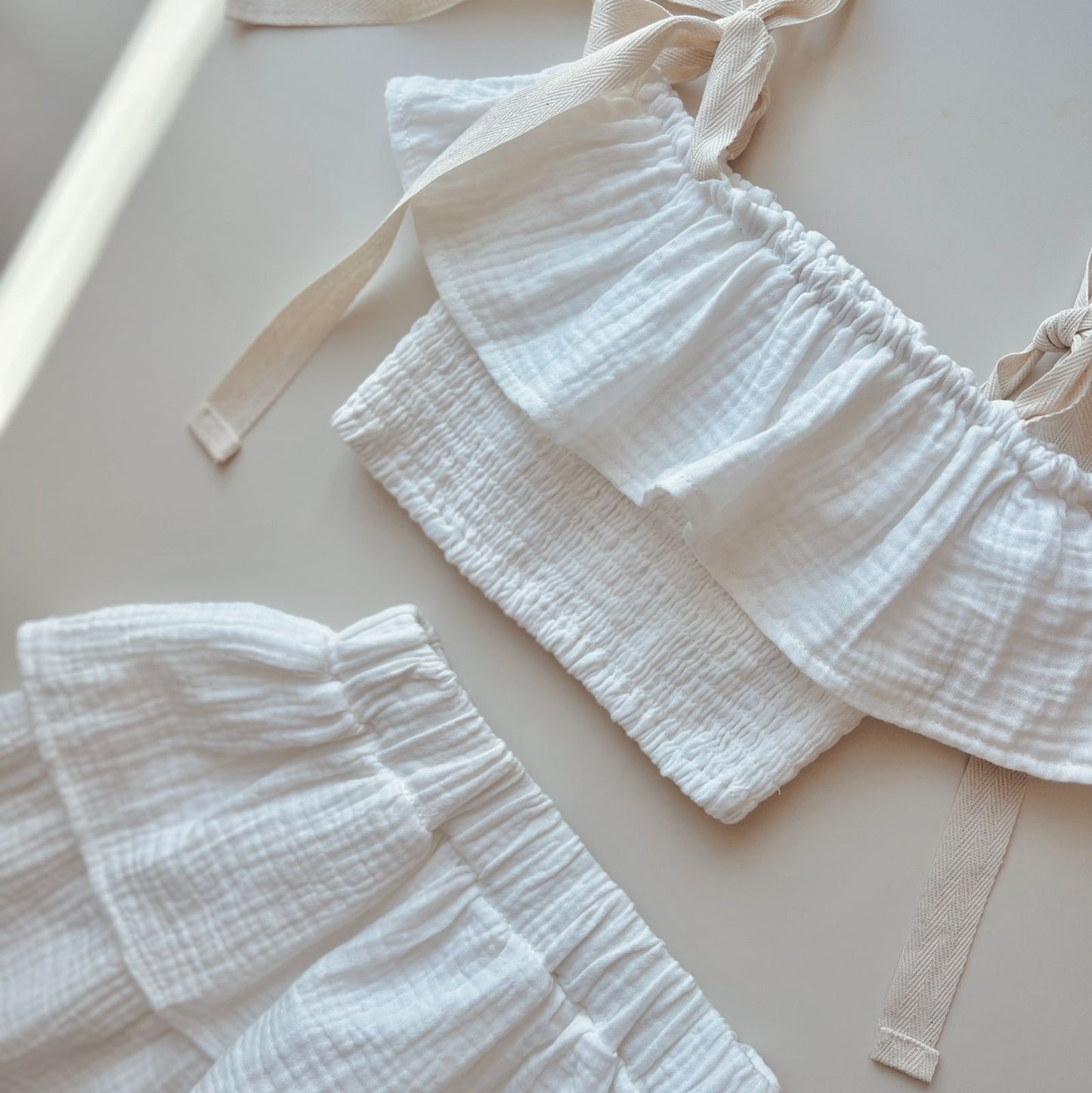 MUSLIN SET WITH CROPPED RUFFLE TOP & MID LENGTH SKIRT