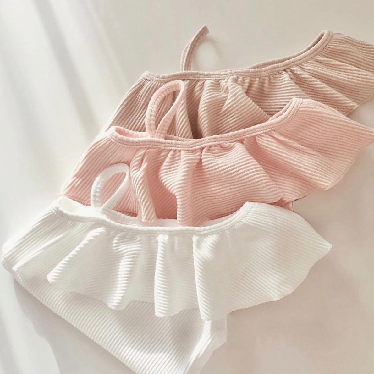 ASYMMETRICAL RIB TOP