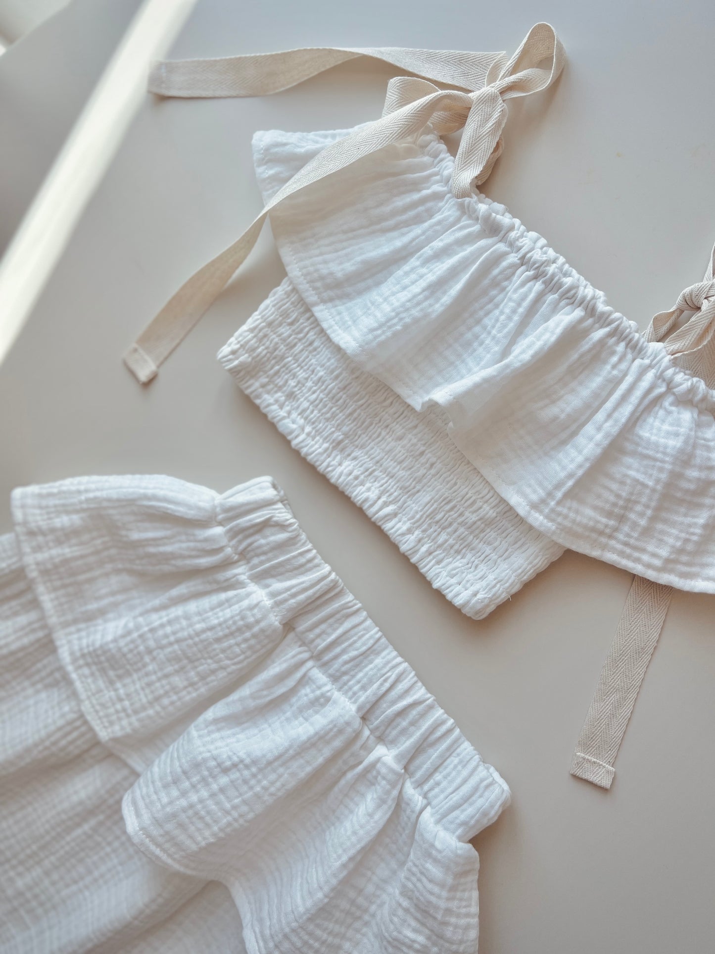 MUSLIN SET WITH CROPPED RUFFLE TOP & MID LENGTH SKIRT